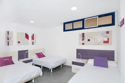 Cama o camas de una habitación en Meloneras Bay Suites