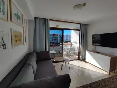 Una televisión o centro de entretenimiento en one bedroom apartment in Playa del Ingles