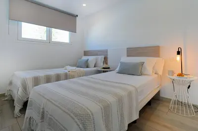 Cama o camas de una habitación en Deva Beach Boutique Apartments