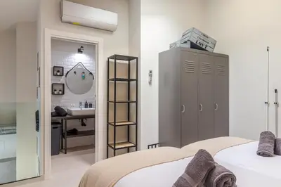 Cama o camas de una habitación en Apartamentos Marina Suites 6E
