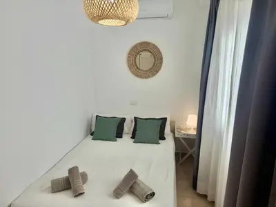 Cama o camas de una habitación en Dominos Apartment with heated pool by SunHousesCanarias