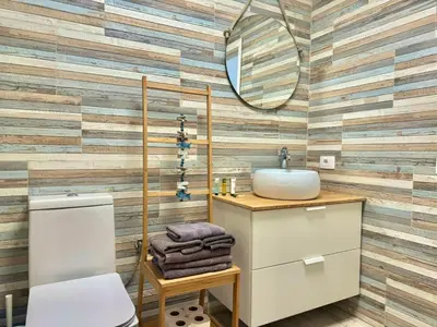 Un baño de Dominos Apartment with heated pool by SunHousesCanarias