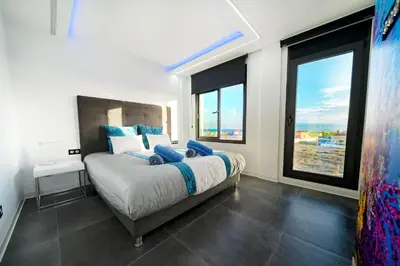 Cama o camas de una habitación en Blue Star Meloneras Villa