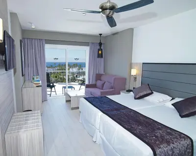 Cama o camas de una habitación en Hotel Riu Palace Meloneras