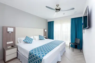 Cama o camas de una habitación en Hotel Riu Papayas - All Inclusive