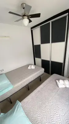 Cama o camas de una habitación en Golden Apartment
