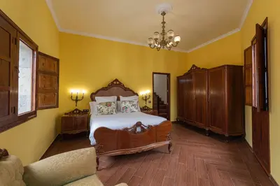 Cama o camas de una habitación en HomeForGuest NEW Duplex with Rooftop next to Arucas Cathedral