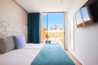 Cama o camas de una habitación en Resort Cordial Santa Águeda & Perchel Beach Club