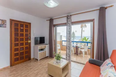 Una televisión o centro de entretenimiento en GuestReady - Bello Horizonte 201