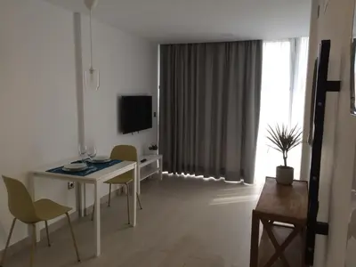 Una televisión o centro de entretenimiento en SUNNY DAY Deluxe 14