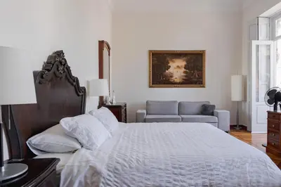 Cama o camas de una habitación en Santa Ana Suite & Rooms