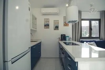 Una cocina o zona de cocina en Bungalow Portos with amazing privet garden
