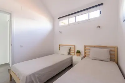 Cama o camas de una habitación en GuestReady - Melocotones 66 - FC