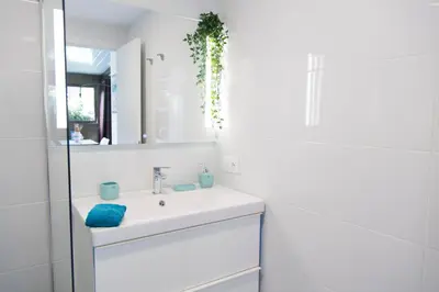 Un baño de Bungalow Atos With Private Garden