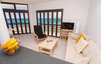 Una televisión o centro de entretenimiento en Arinaga Colors, tu casa en la playa