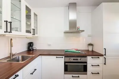 Una cocina o zona de cocina en Harbour 374 with private roof terrace in Puerto de Mogan by El Sirocco