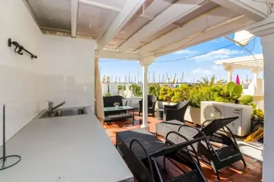 Un balcón o terraza de Harbour 374 with private roof terrace in Puerto de Mogan by El Sirocco