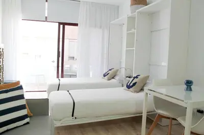 Cama o camas de una habitación en VV Loft Canteras Gran Playa 