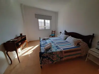 Cama o camas de una habitación en Atico en la Playa de La Aldea.