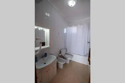 Un baño de Atico en la Playa de La Aldea.