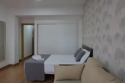Cama o camas de una habitación en Hotel Las Palmas Urban Center