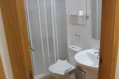 Un baño de Hotel Las Palmas Urban Center