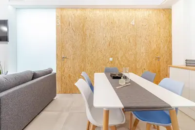 Zona de estar de Paez Suites
