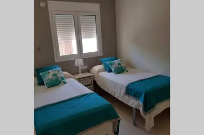 Cama o camas de una habitación en Espacioso Bungalow 2 dormitorios en Maspalomas