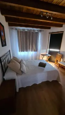 Cama o camas de una habitación en El Pajar