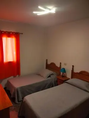 Cama o camas de una habitación en FRALEMAR Arinaga - San Francisco