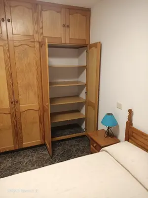 Cama o camas de una habitación en FRALEMAR Arinaga - San Francisco