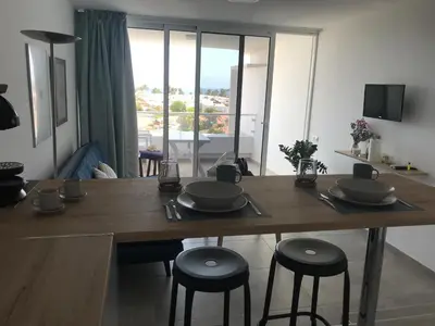 Una televisión o centro de entretenimiento en Apartamento JOSE