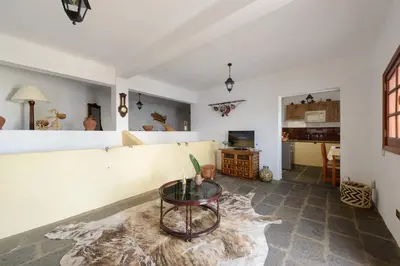 Una televisión o centro de entretenimiento en Las Esterlicias ( Villa Rural Ecológica )
