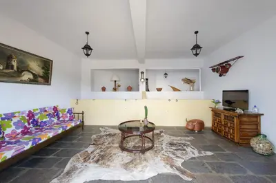 Una televisión o centro de entretenimiento en Las Esterlicias ( Villa Rural Ecológica )