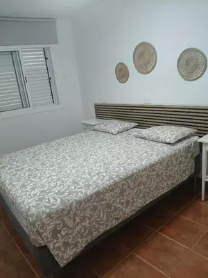 Cama o camas de una habitación en Charming seaside apartment in Puerto de Mogán, 60 sqm