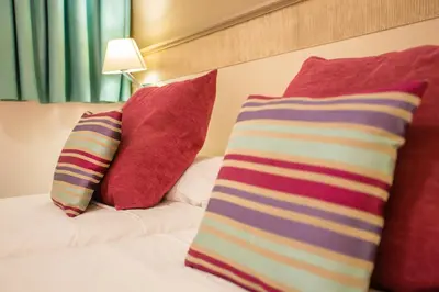 Cama o camas de una habitación en Amadores Beach Apartments