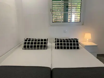 Cama o camas de una habitación en Sonnenland Suites