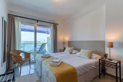 Cama o camas de una habitación en OMBÚMOGAMAR