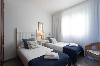 Cama o camas de una habitación en OMBÚMOGAMAR