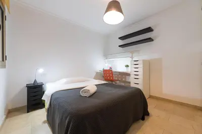 Cama o camas de una habitación en SG Carlos Family House