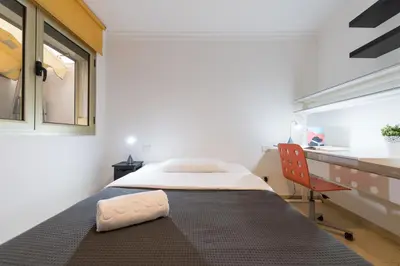 Cama o camas de una habitación en SG Carlos Family House