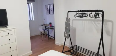Una televisión o centro de entretenimiento en Apartamento cerca de la Playa de Las Canteras