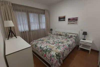 Cama o camas de una habitación en Las Canteras Hierro-1