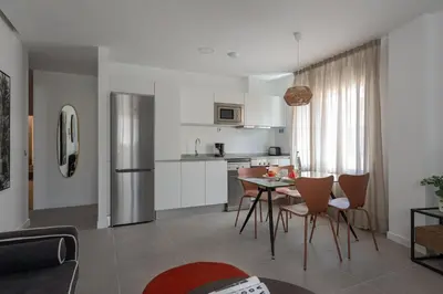 Una cocina o zona de cocina en Royal Flats-Viviendas Vacacionales