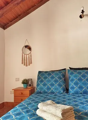 Cama o camas de una habitación en Casas Blancas - Suite 1