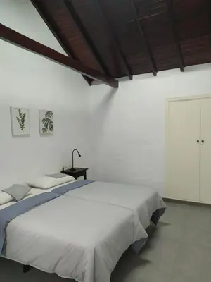 Cama o camas de una habitación en Moya, Senderos y naturaleza