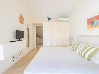 Cama o camas de una habitación en BLUE MARLIN APARTMENT - GRAN CANARIA STAYS