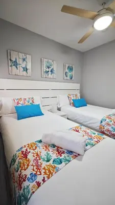 Cama o camas de una habitación en OHANA