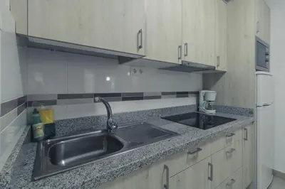 Una cocina o zona de cocina en Puerto Mogan Apartment