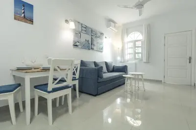 Zona de estar de Puerto Mogan Apartment